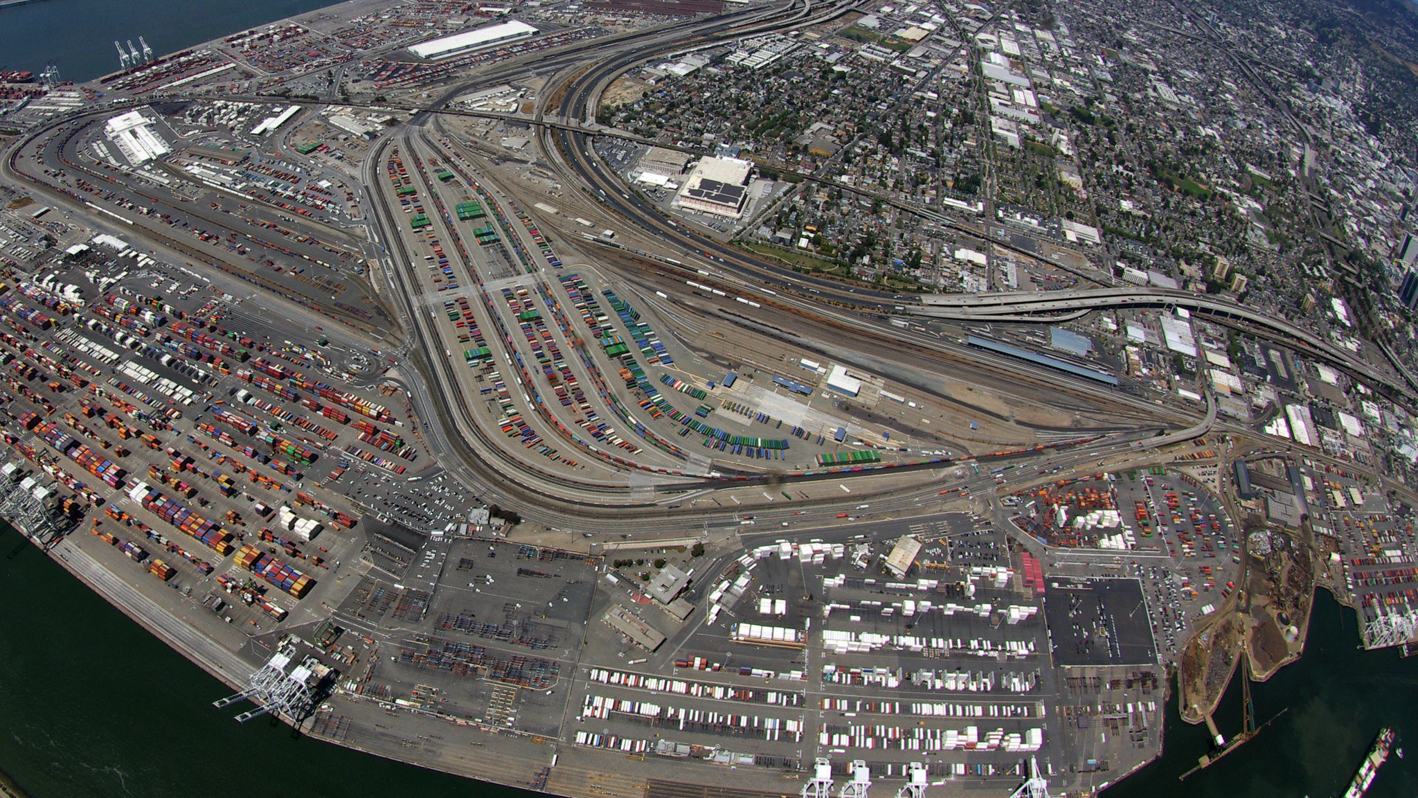 Aerial view of the Port of Oakland surrounding the West Oakland neighborhood (image © Port of Oakland).