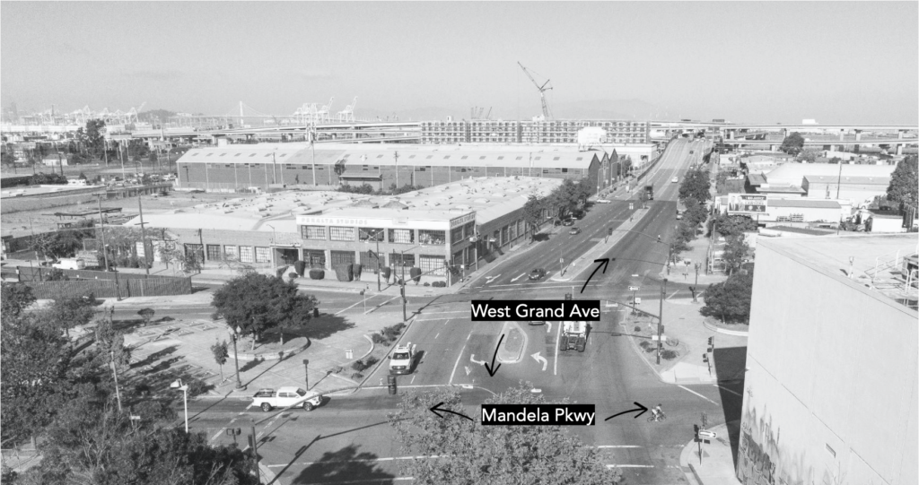 Aerial black-and-white photograph of the intersection at Mandela and West Grand.