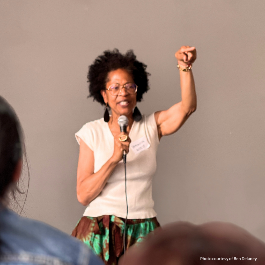 WOEIP Executive Director Veronica Eady addresses a crowd